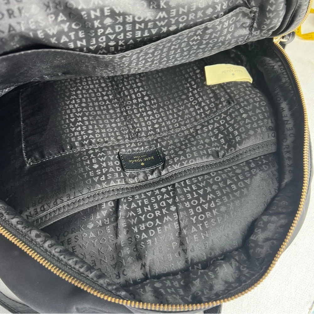Kate Spade black gold zippers back pack